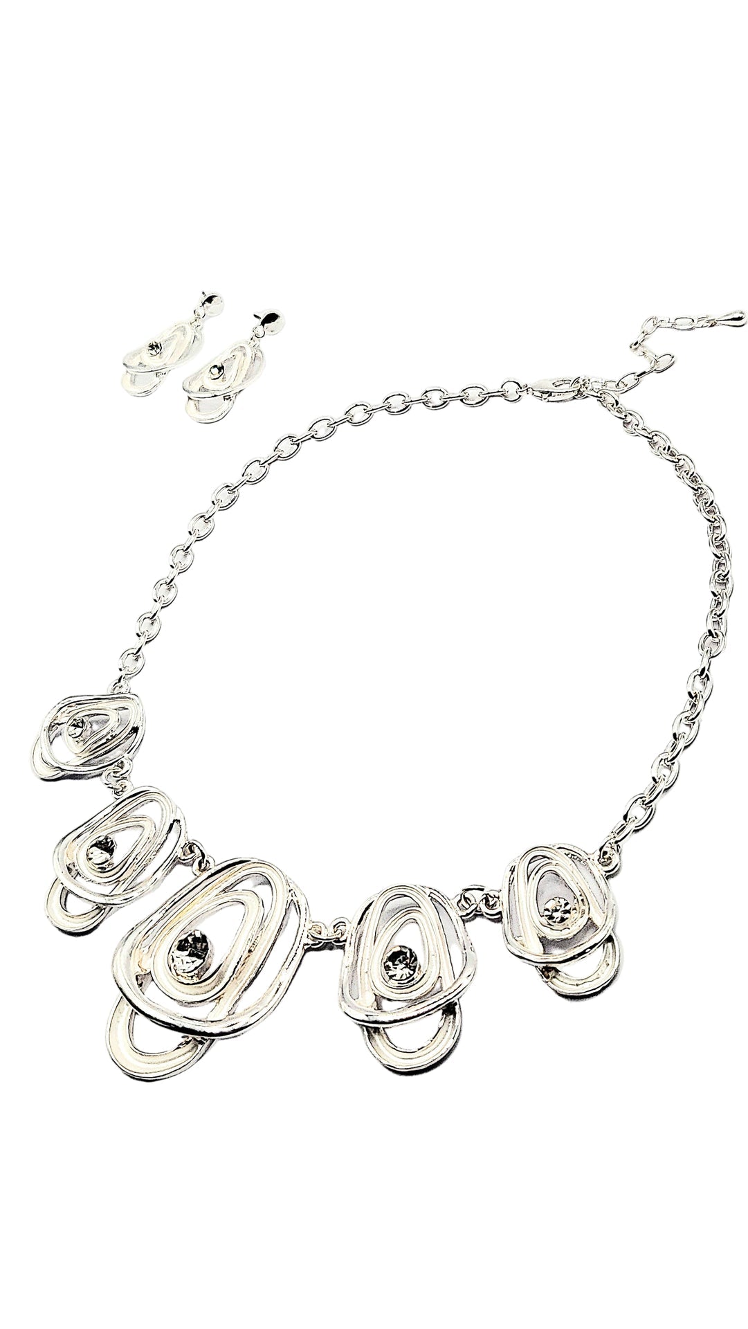 Silver necklace with floral designs on a white background