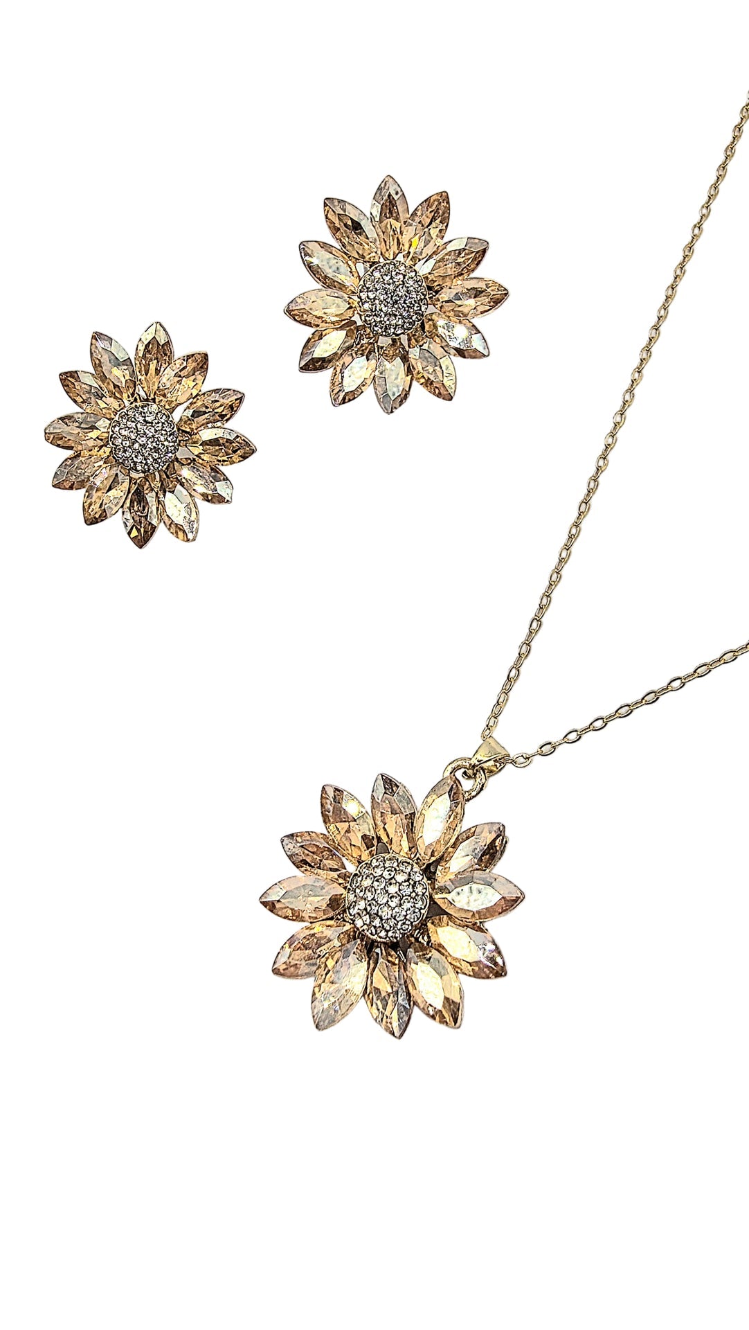 Sunflower-shaped jewelry set with necklace and earrings on a light gray background